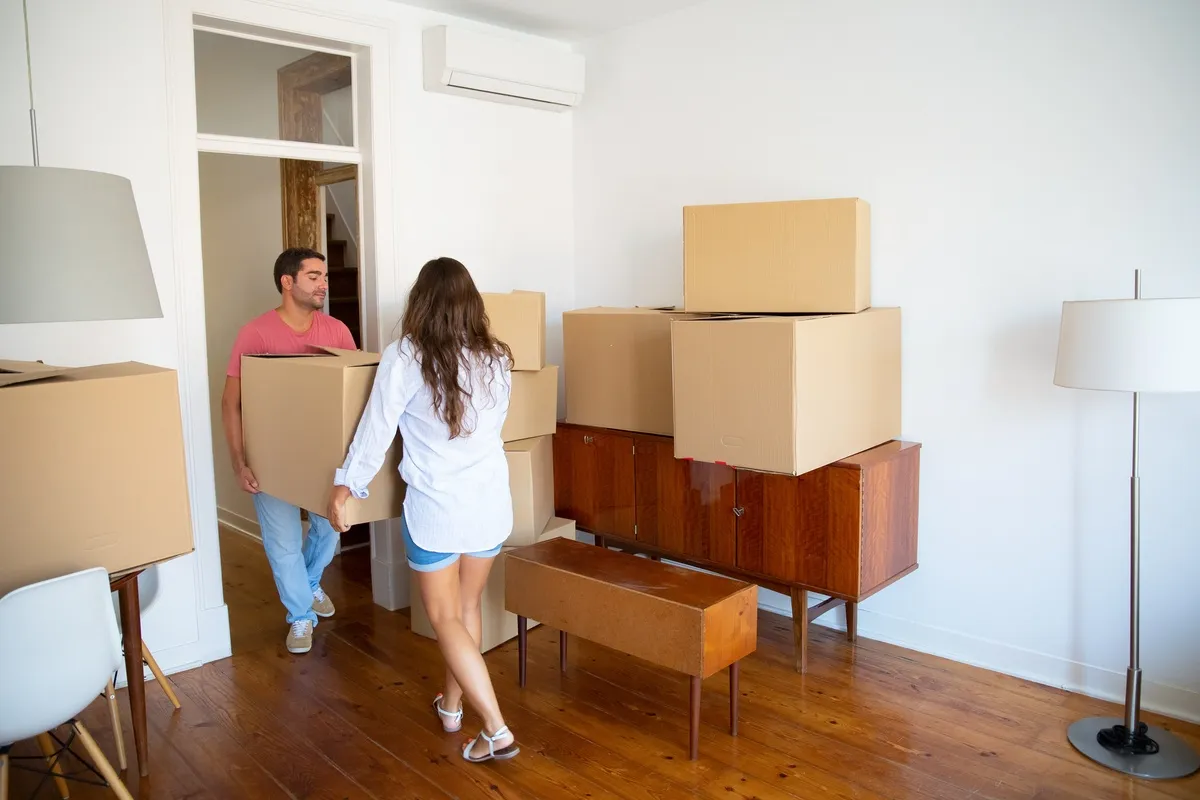 Family Couple Leaving Their Apartment Carrying Carton Boxes Furniture 1